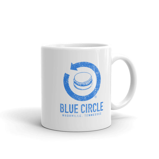 Blue Circle Arrow Logo White Glossy Mug by RICK BALDWIN